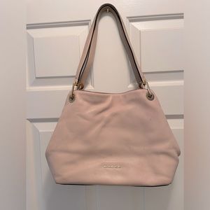 Michael Kors beautiful pink leather shoulder purse.